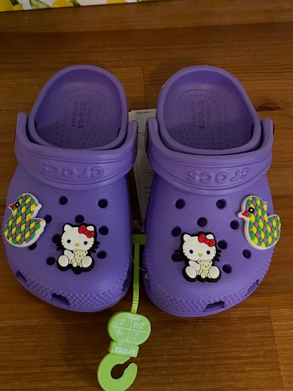 CROCS Kids Purple Clogs with Hello Kitty & Colorful Duck Charms Size C7